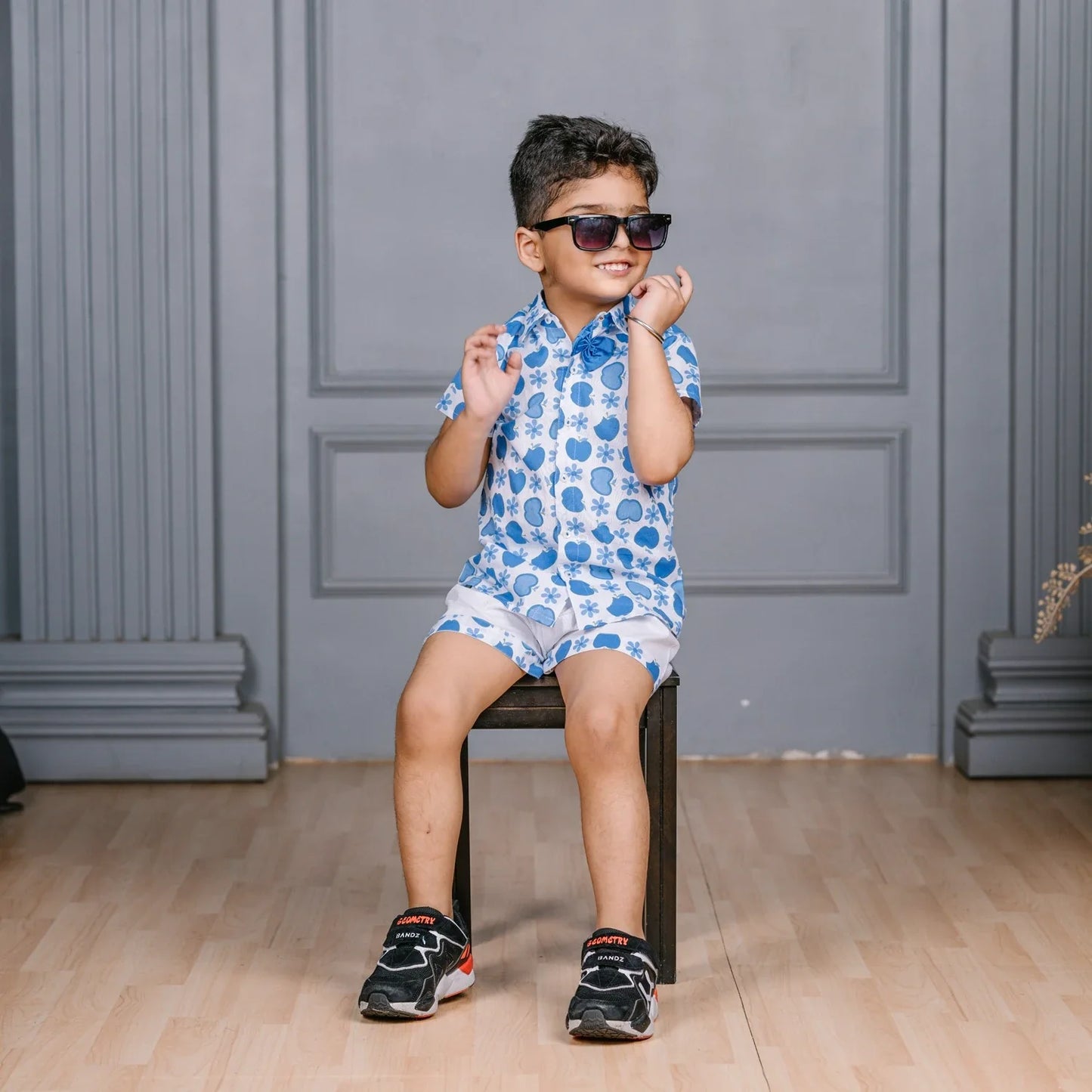 BLUE APPLE PRINT SHIRT PAIRED WITH WHITE SHORTS